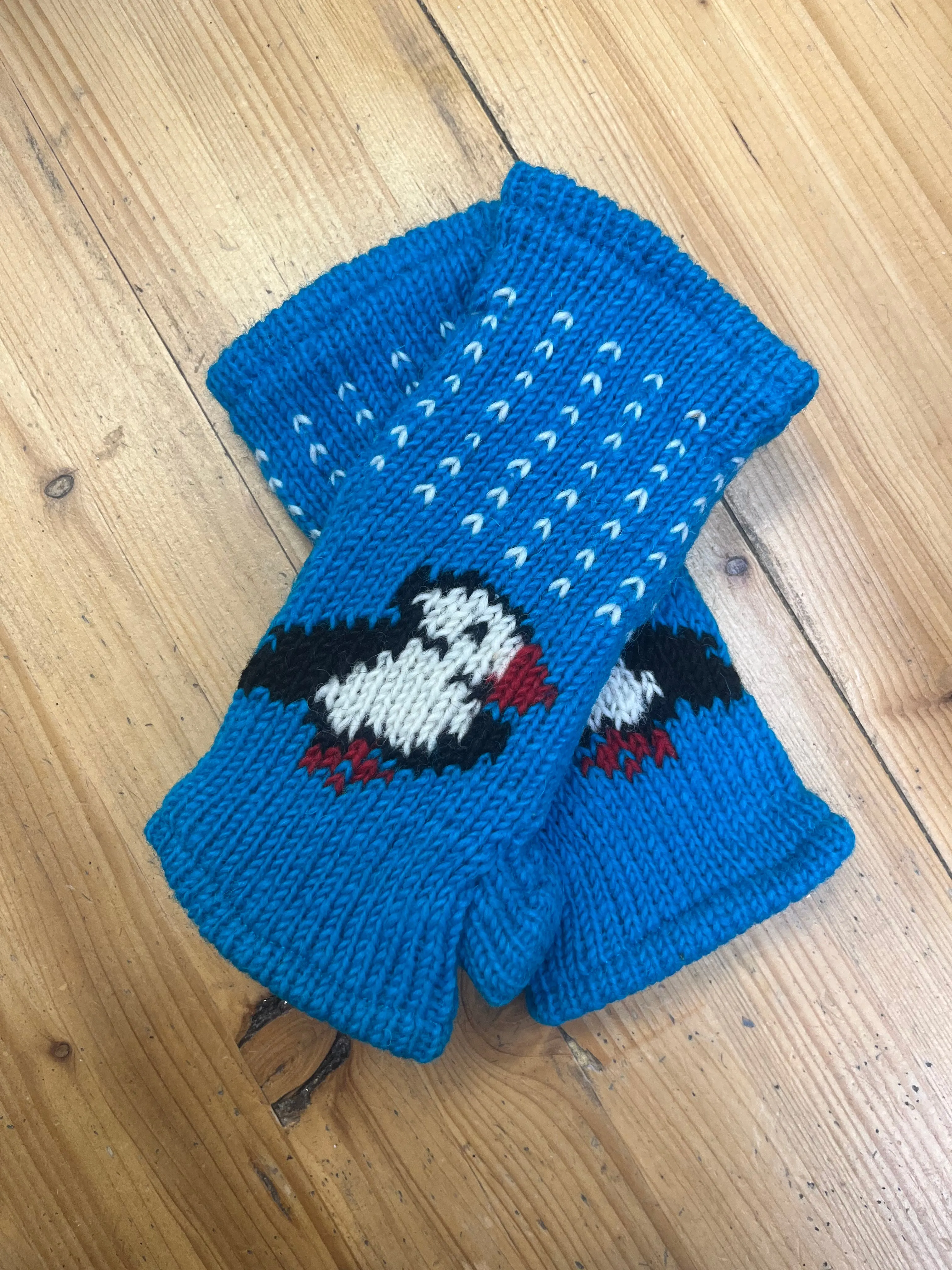 From The Source Hand Knitted Puffin Wristwarmers