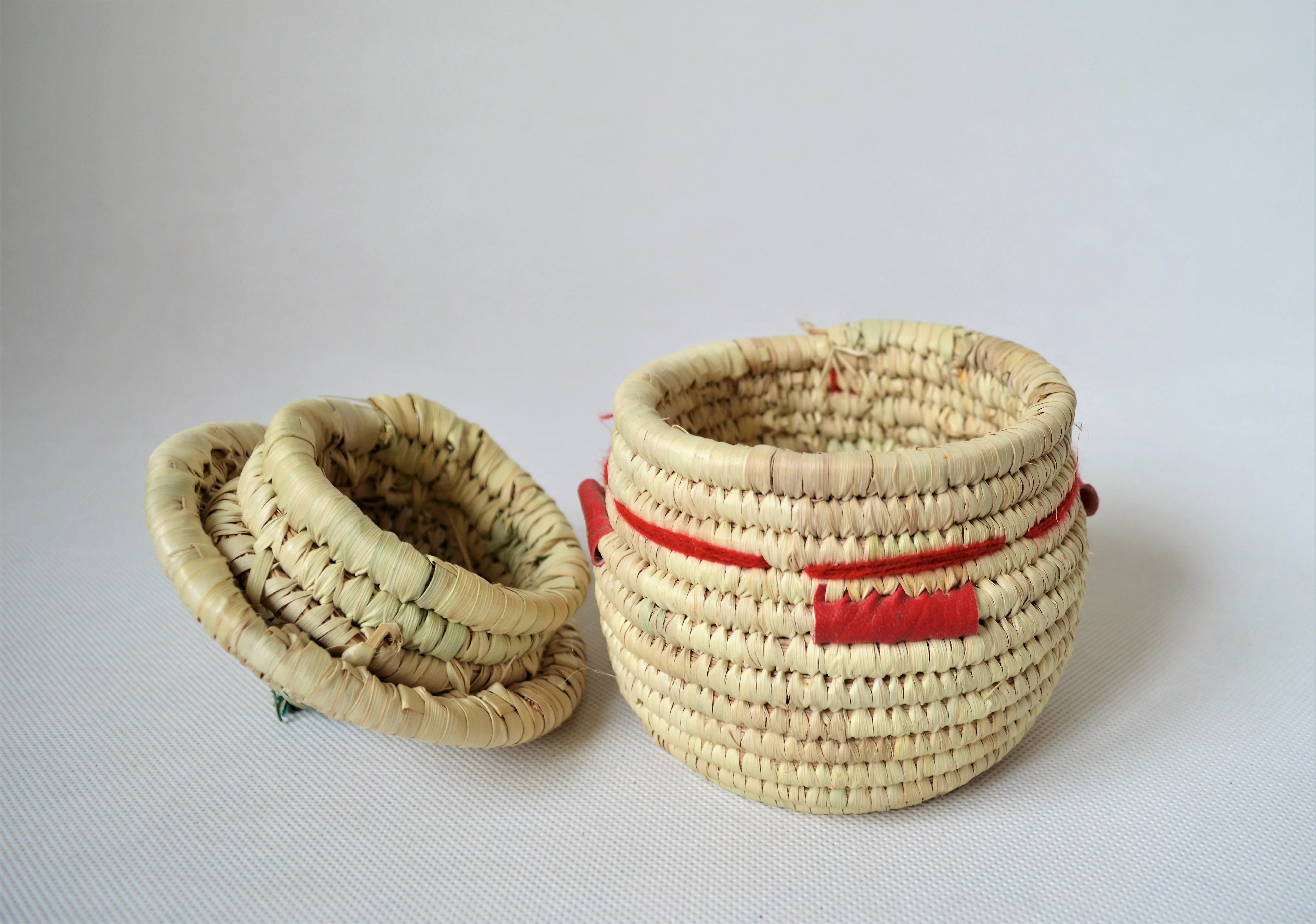 Woven African basket with a fitted lid